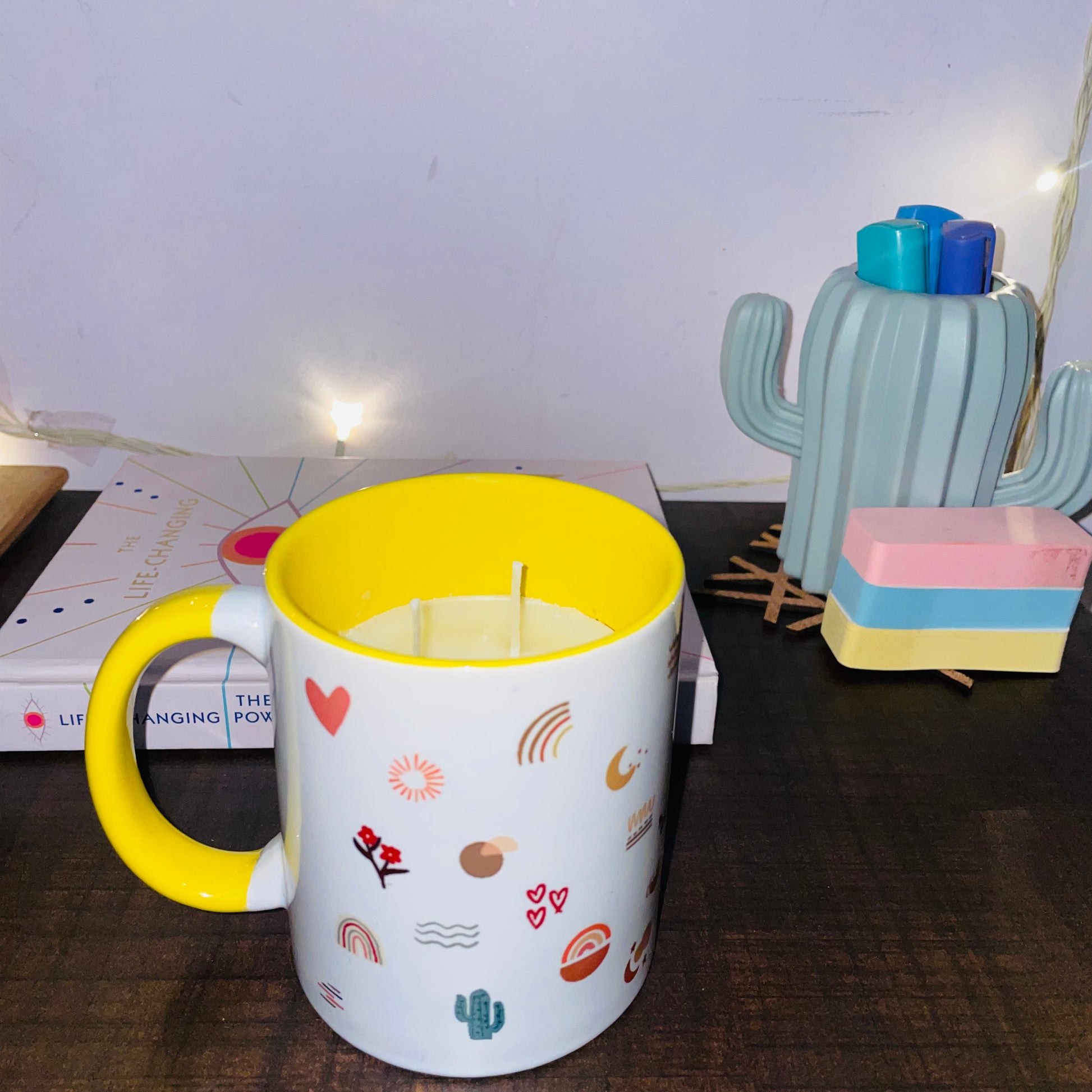 soy wax candle buy online scented candles in india begramot vanilla ylang ylang pastel candle in yellow ceramic coffee mug turn up your magic pastel CANDL from posh the studio bath and body works candles india buy online